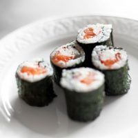 Salmon roll in plate.